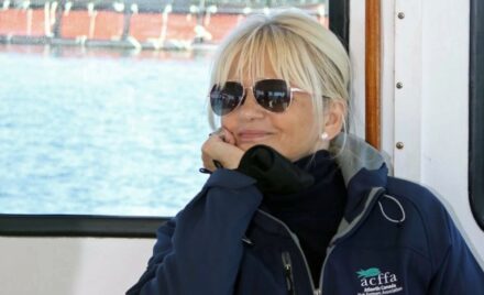 Woman on boat near water.